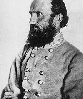 Black and white portrait of a bearded man in a Confederate uniform.